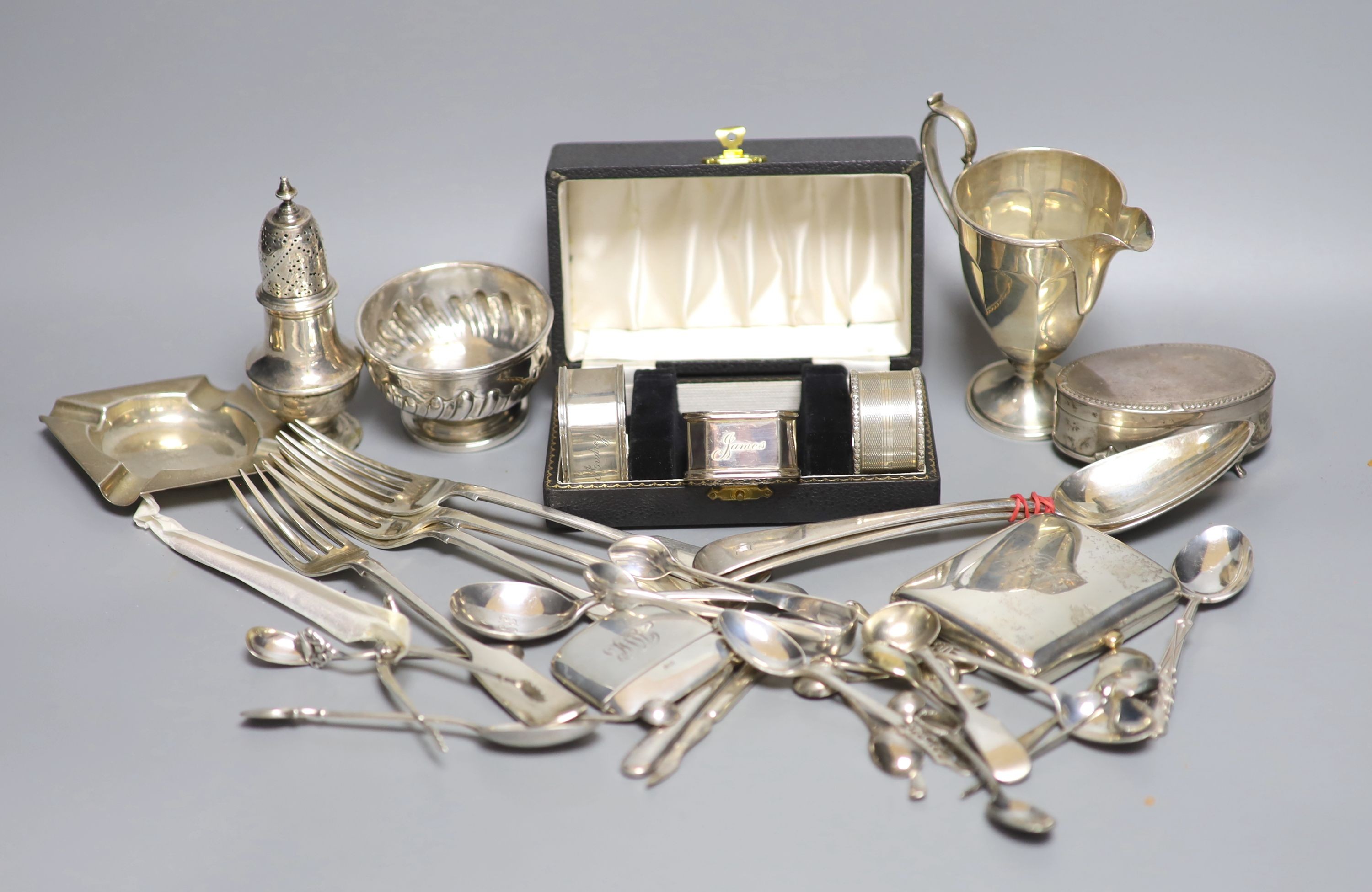 Sundry silver and plated items including flatware, sugar nips, small bowl, ashtray, cigarette case, pepperette, trinket box etc. weighable silver 31oz.